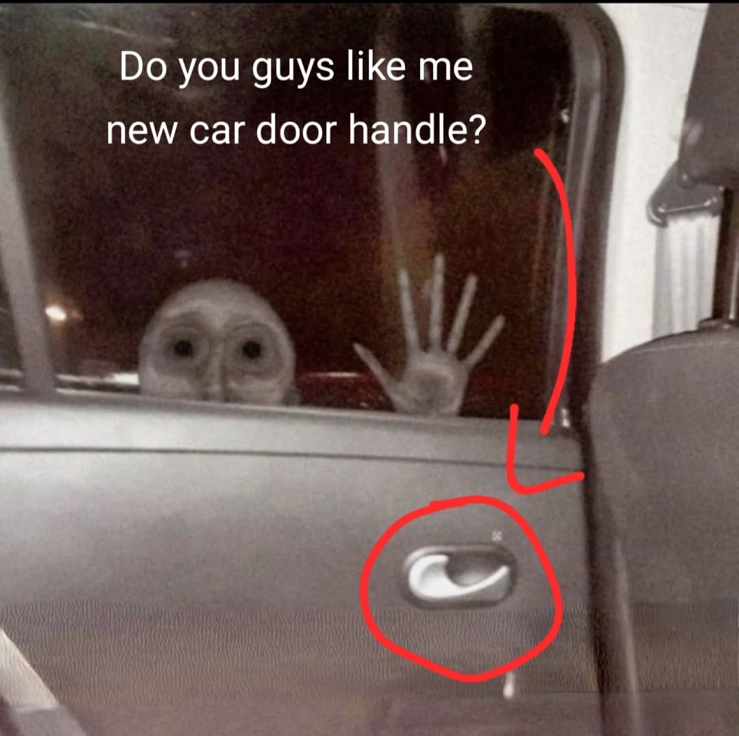 Wide-eyed alien pressed against a car window under 'Do you guys like me new car door handle?'