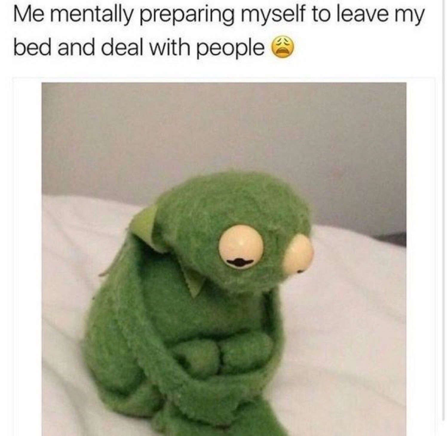 Kermit huddled on a bed under 'Me mentally preparing myself to leave my bed and deal with people ๐ฉ'