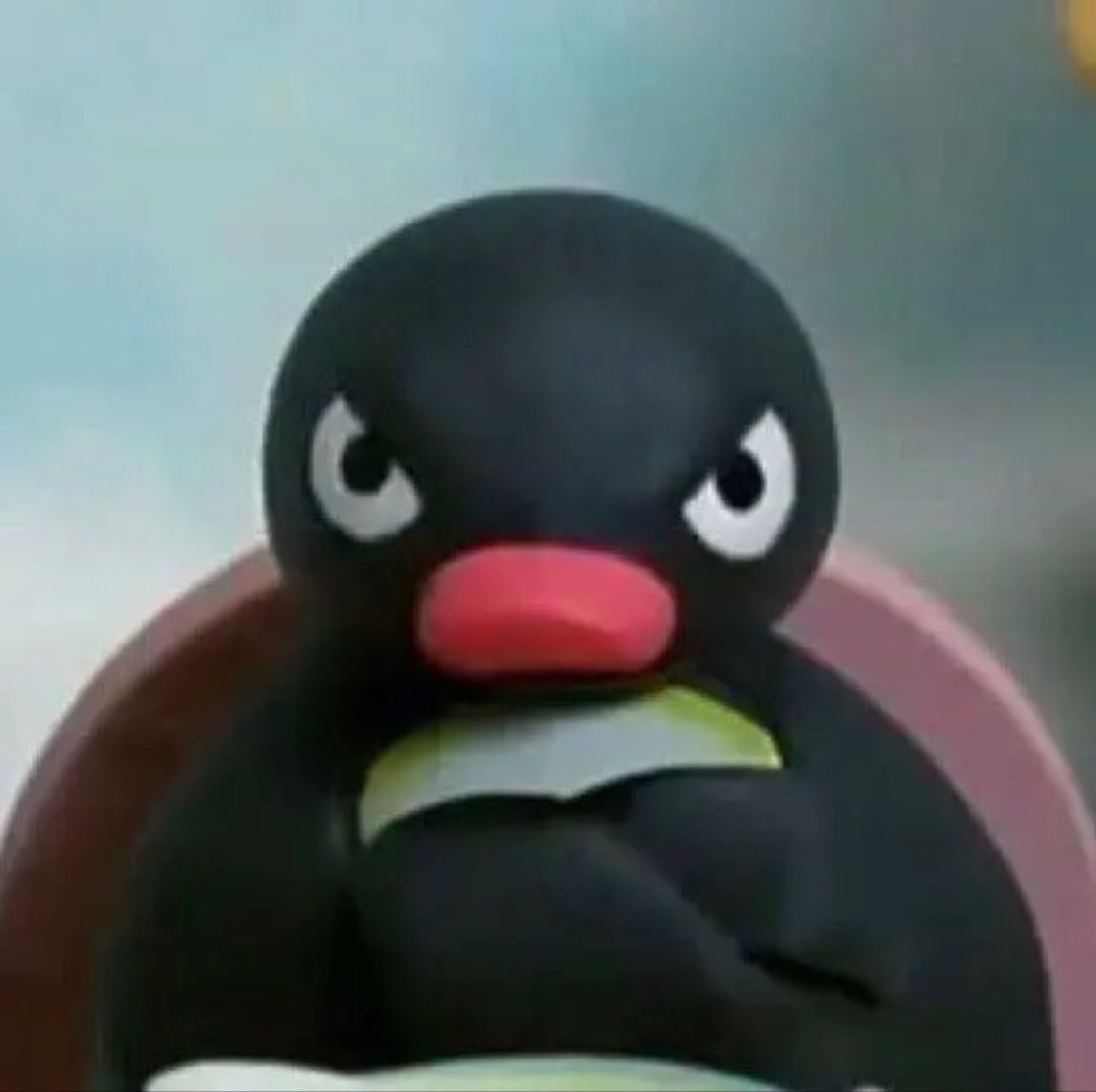 Pingu the claymation penguin glaring with furious, narrowed eyes