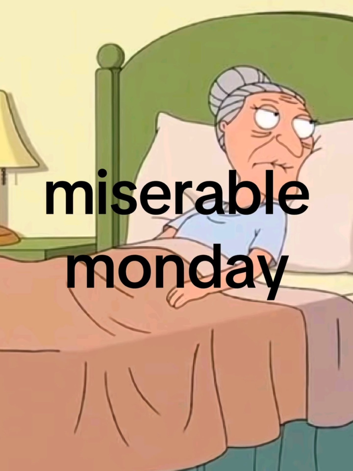Family Guy grandma sitting up in bed, exhausted, under 'miserable monday'