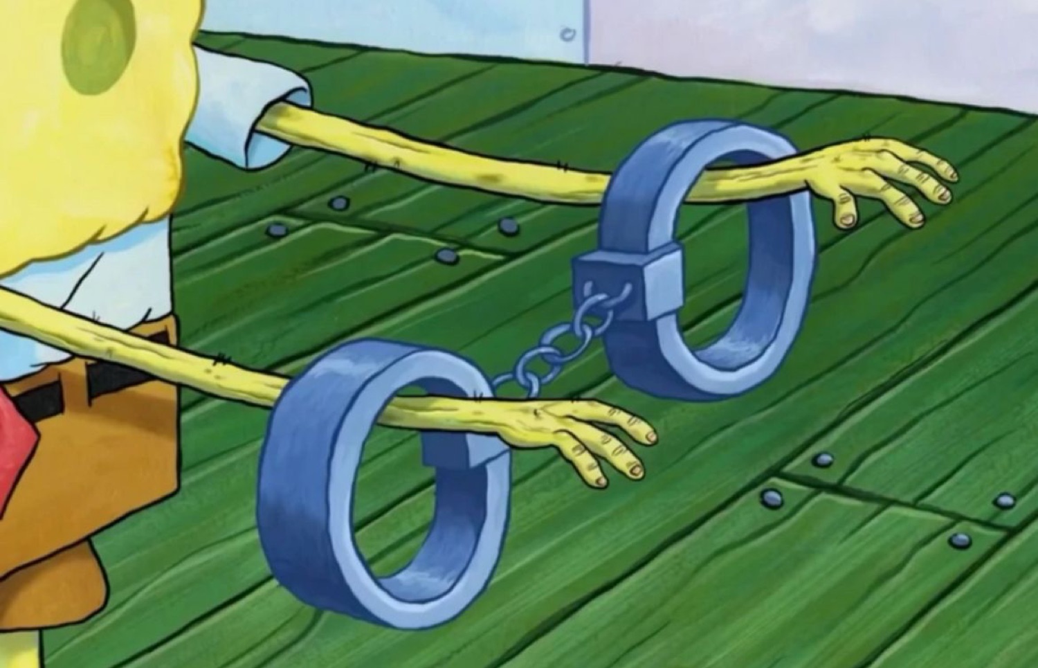SpongeBob's noodly arms sliding right out of a pair of handcuffs