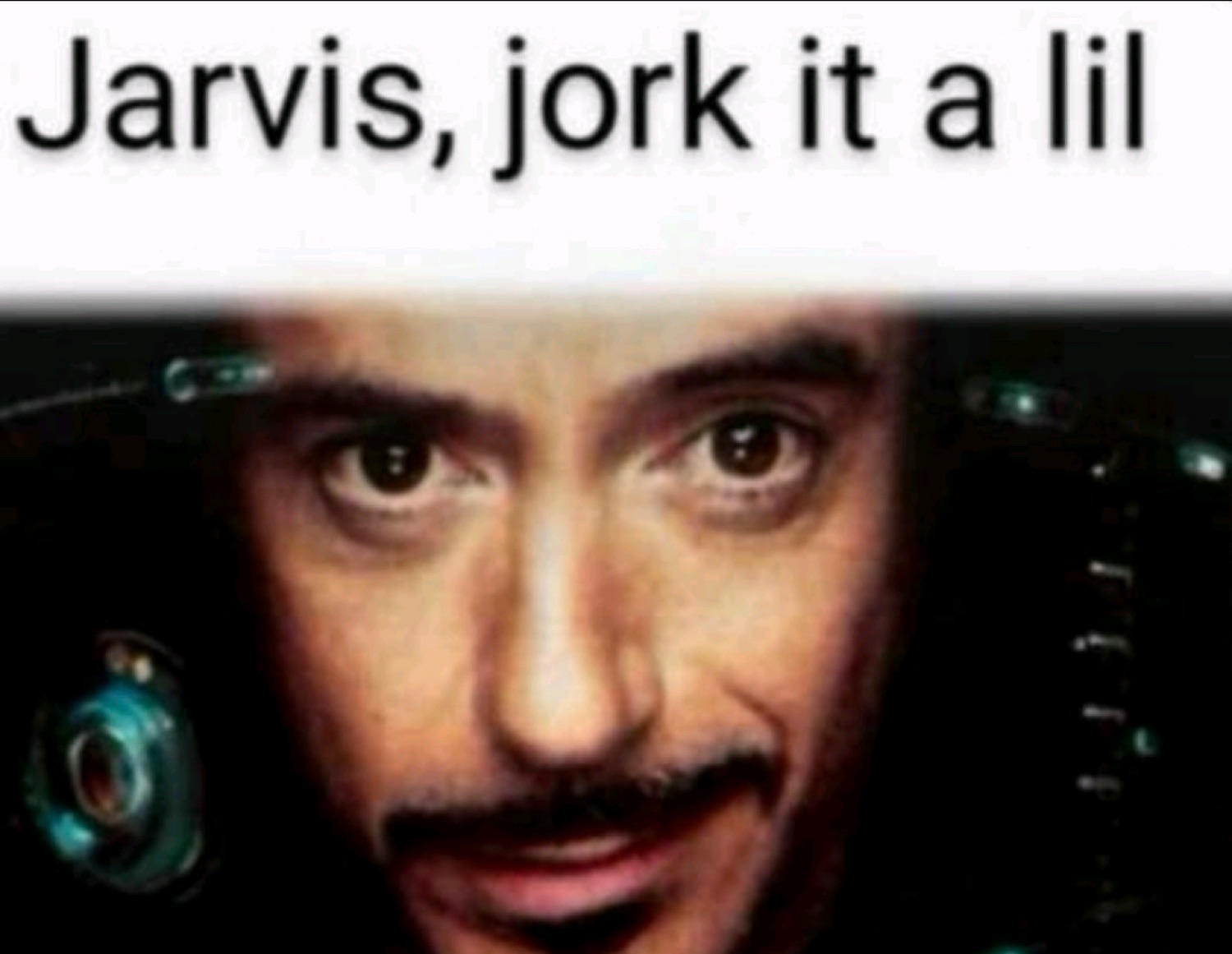 Tony Stark close-up staring dead ahead captioned 'Jarvis, jork it a lil'