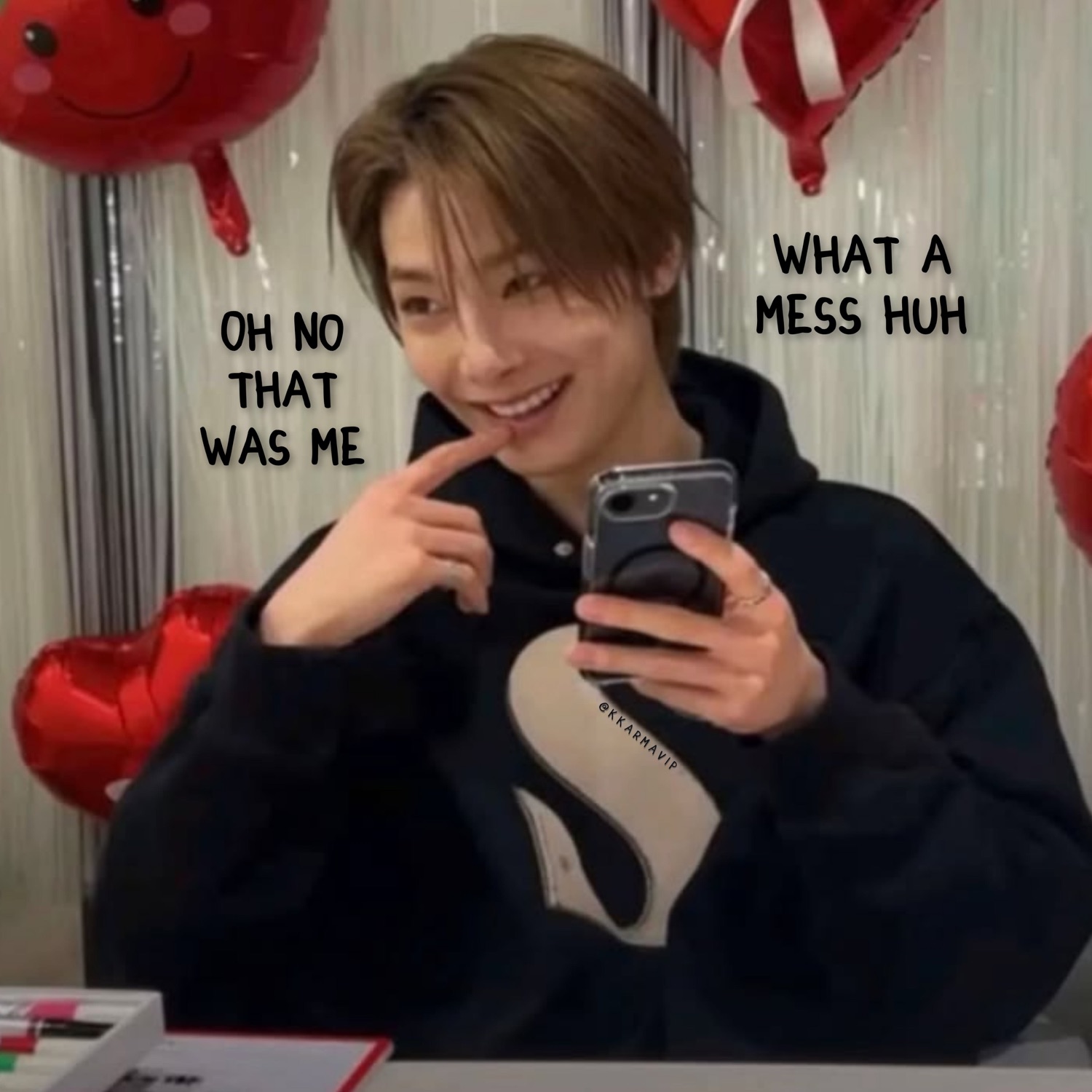 Young man taking a mirror selfie smiling mischievously, captioned 'OH NO THAT WAS ME WHAT A MESS HUH'