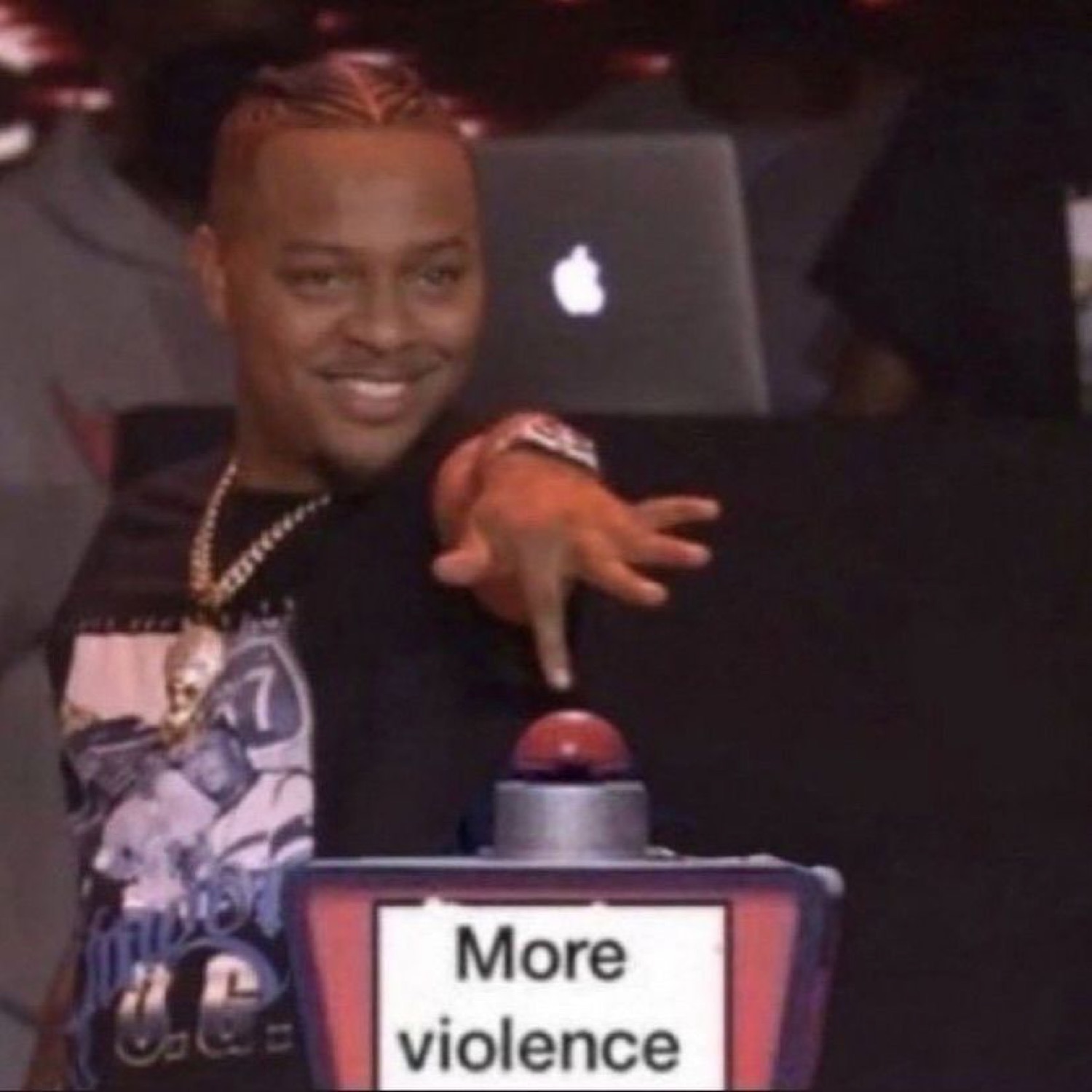 Man at DJ booth reaching for a red button labeled 'More violence' with a knowing grin