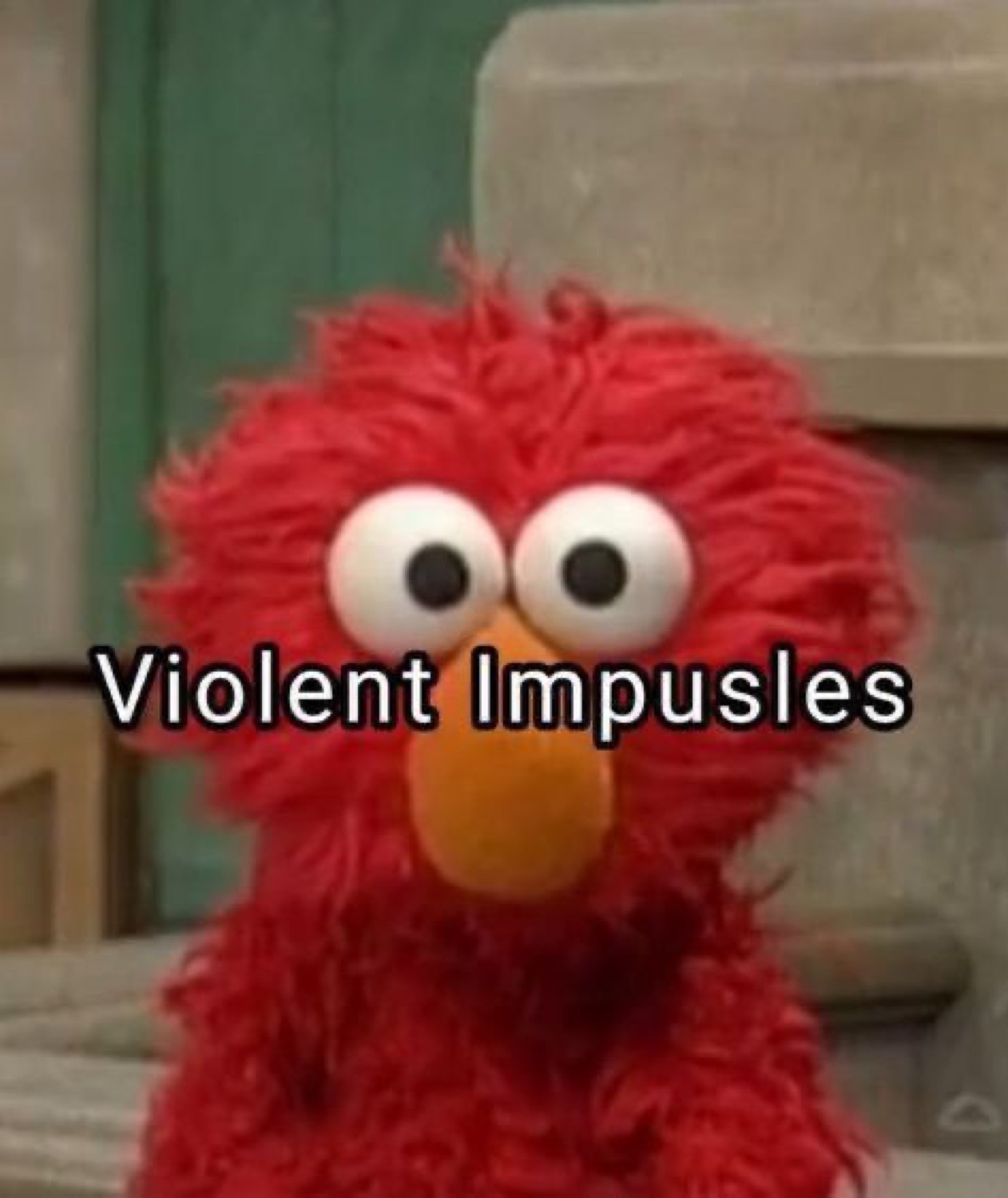 Wide-eyed Elmo staring straight ahead labeled 'Violent Impusles'