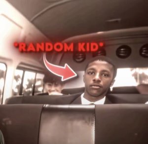 Young man on a bus with a completely flat, empty expression, labeled '*RANDOM KID*'