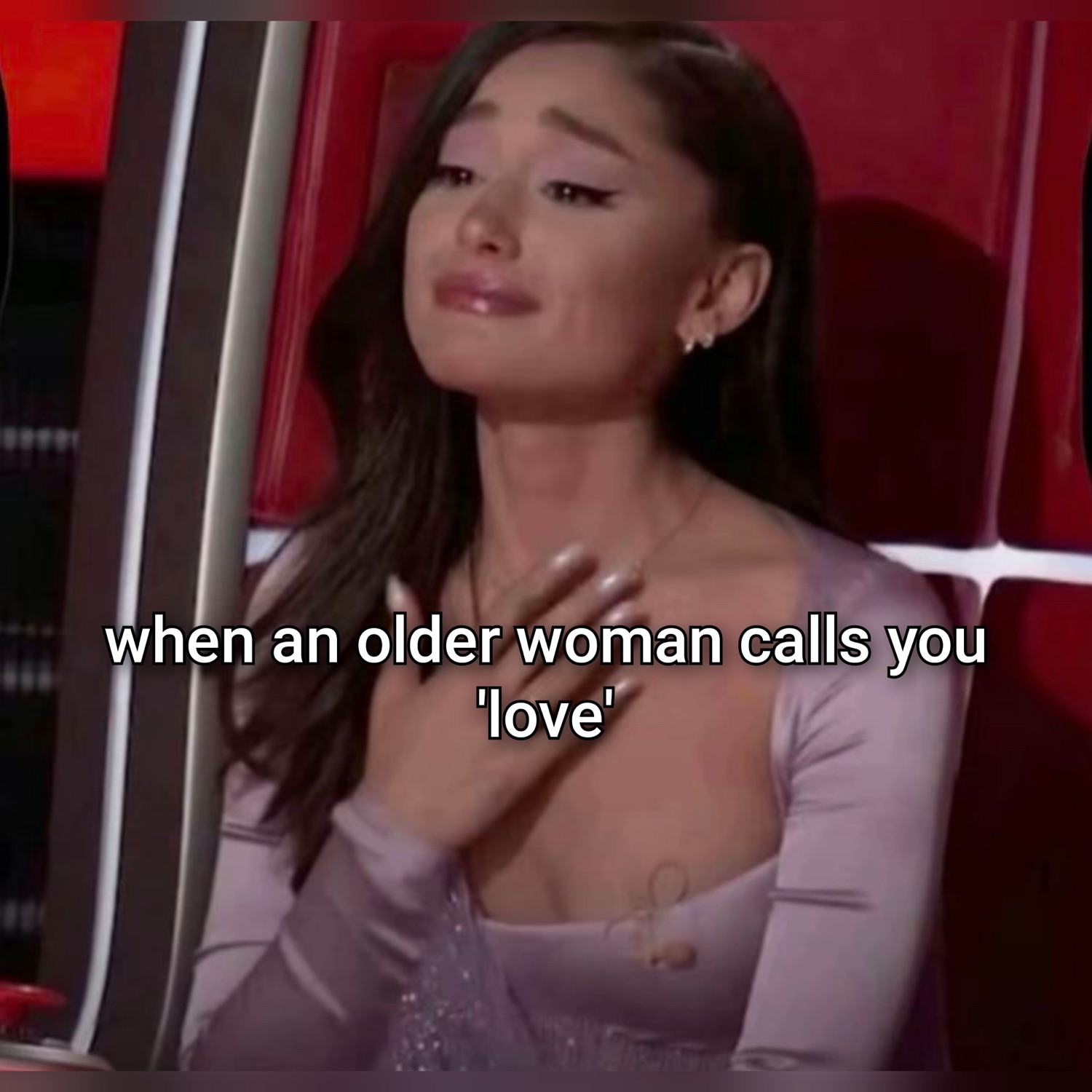 Ariana Grande pressing a hand to her chest, touched, under 'when an older woman calls you 'love''