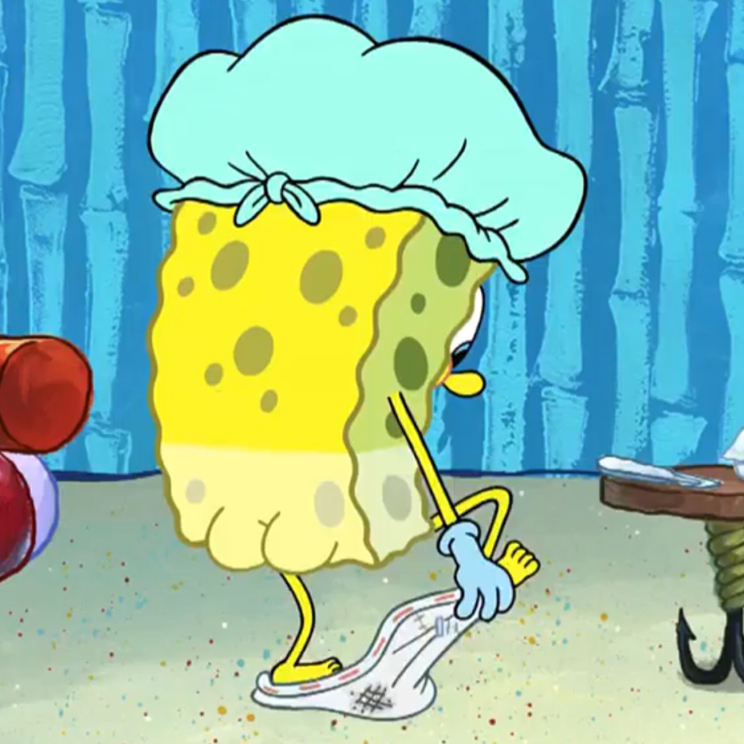 SpongeBob in a shower cap lazily dragging a mop across the floor