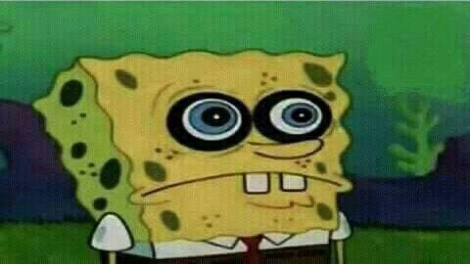 SpongeBob with huge swirly bloodshot eyes and gritted buck teeth