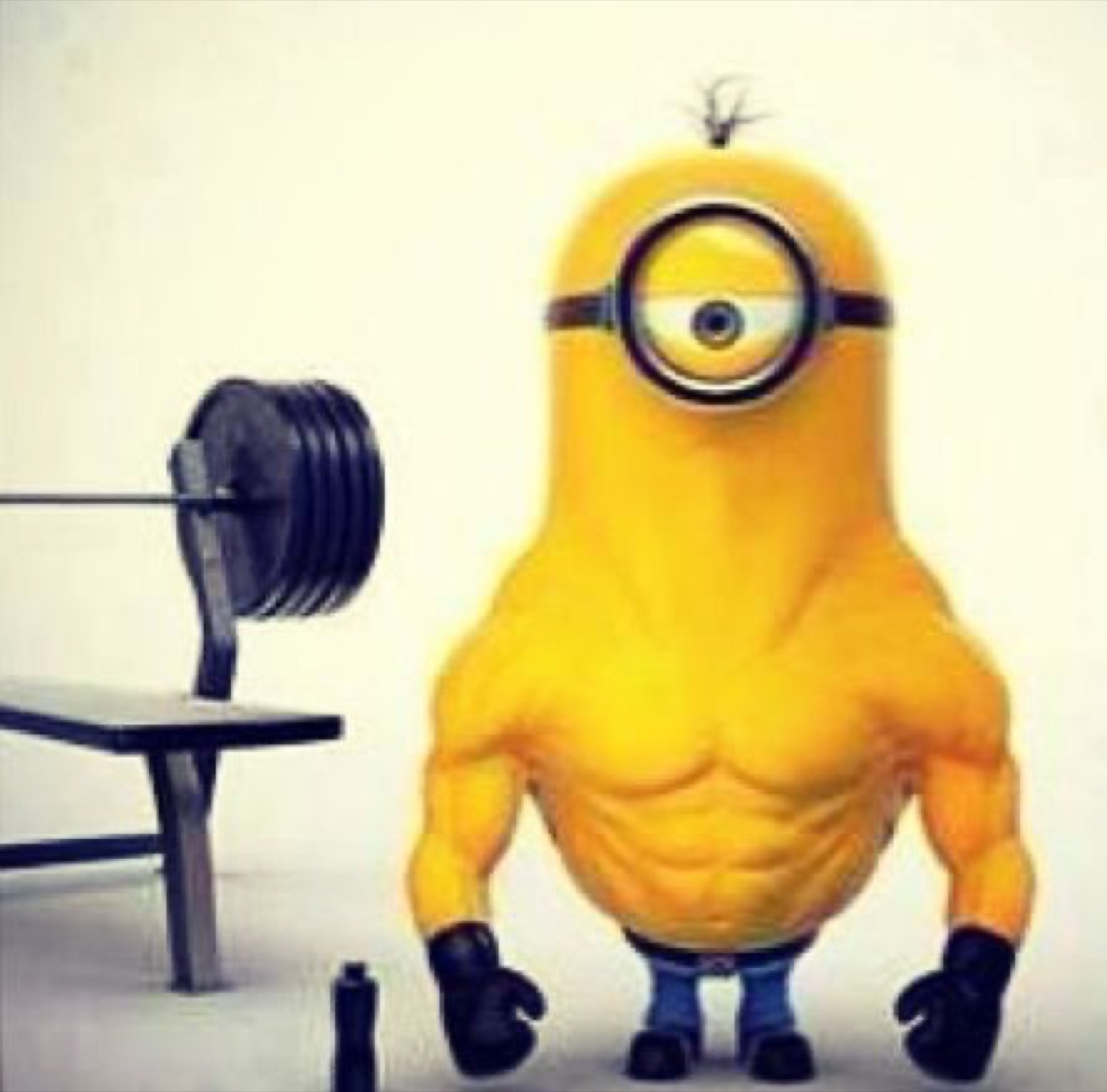 Absurdly buff Minion next to a barbell