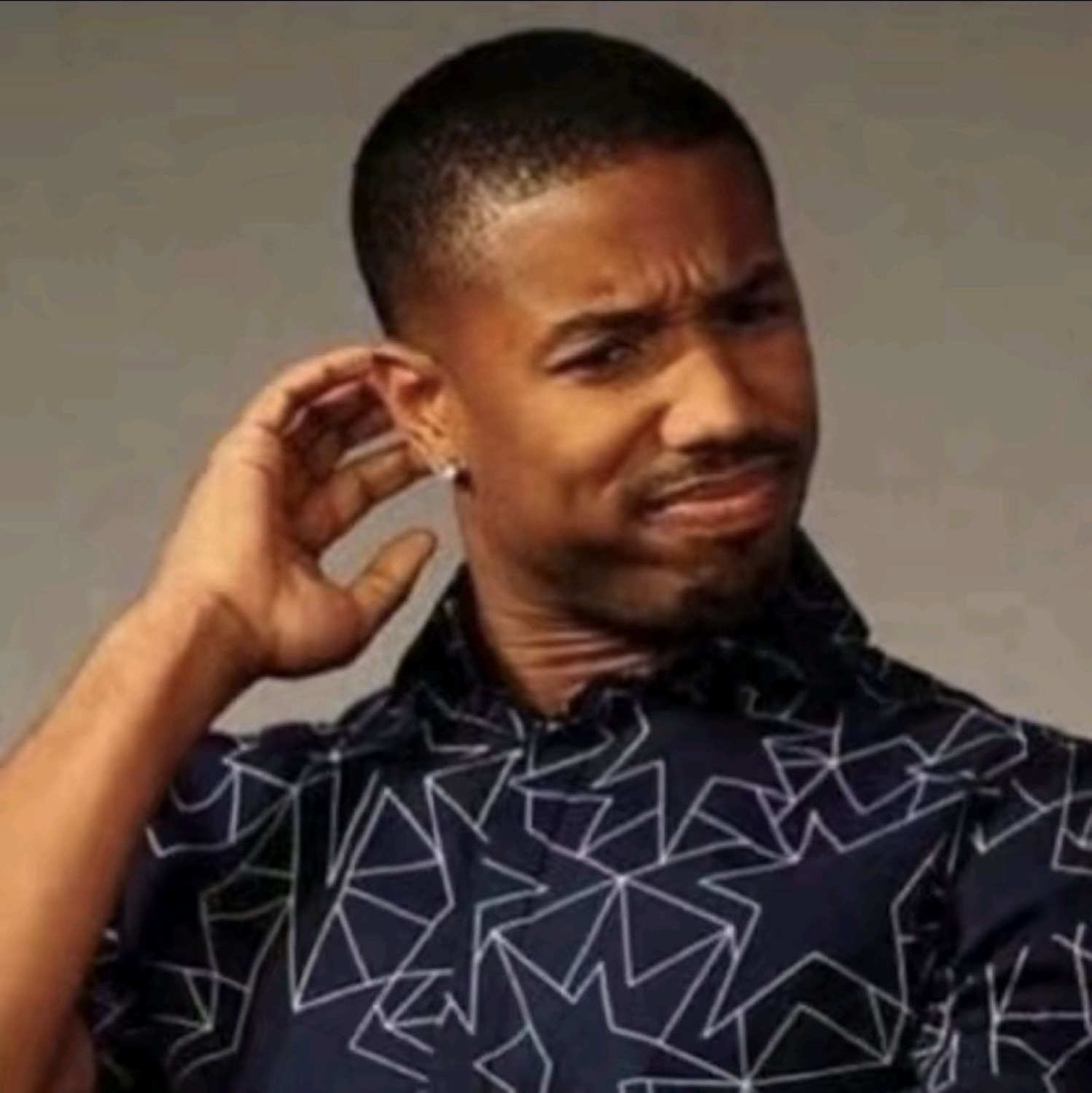 Man scratching his head with a skeptical, screwed-up face like he doesn't buy it