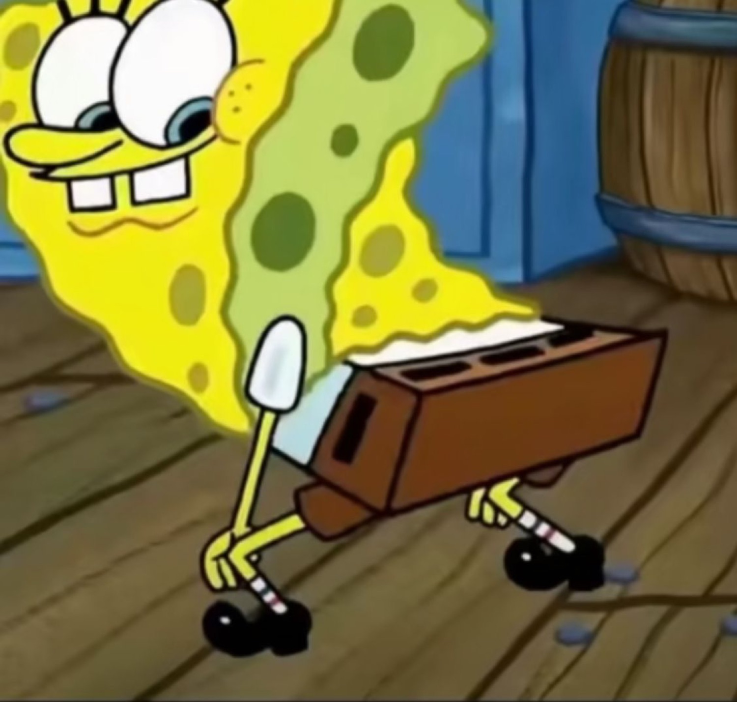 SpongeBob shimmying with a brick strapped behind him