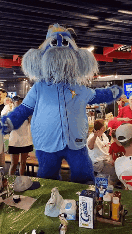 Raymond the Tampa Bay Rays mascot dancing in the stands