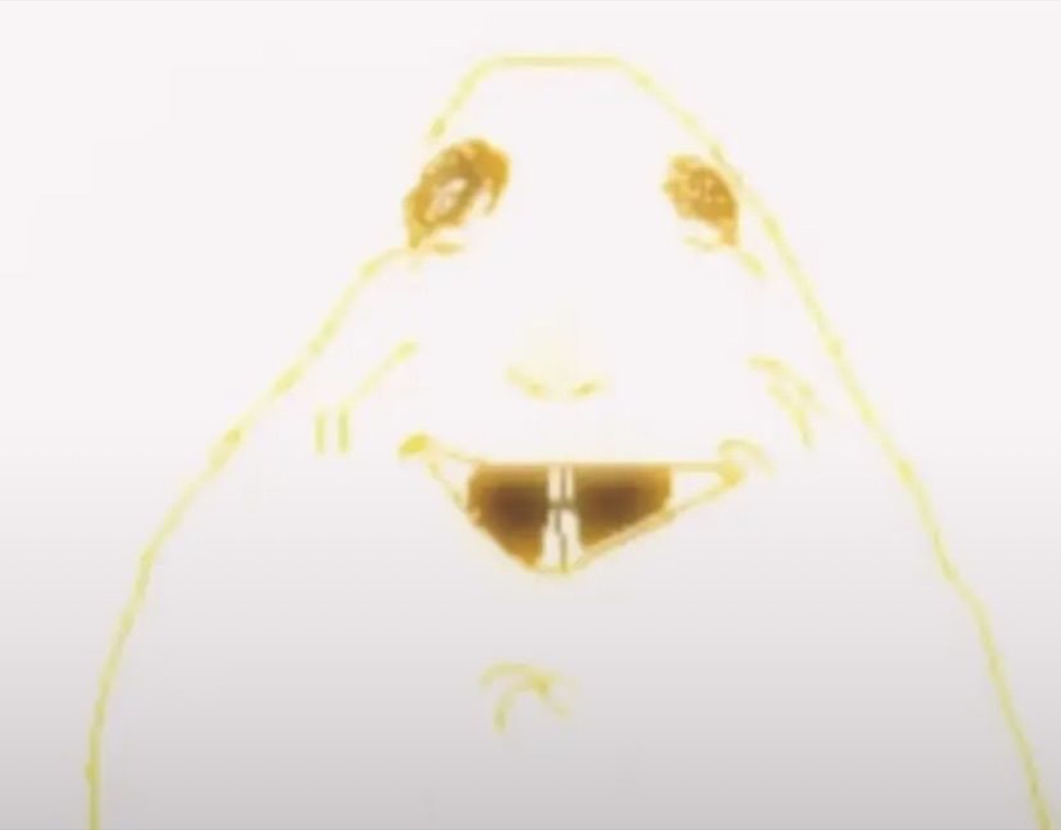 Washed-out yellow doodle face with a wide, unsettling grin
