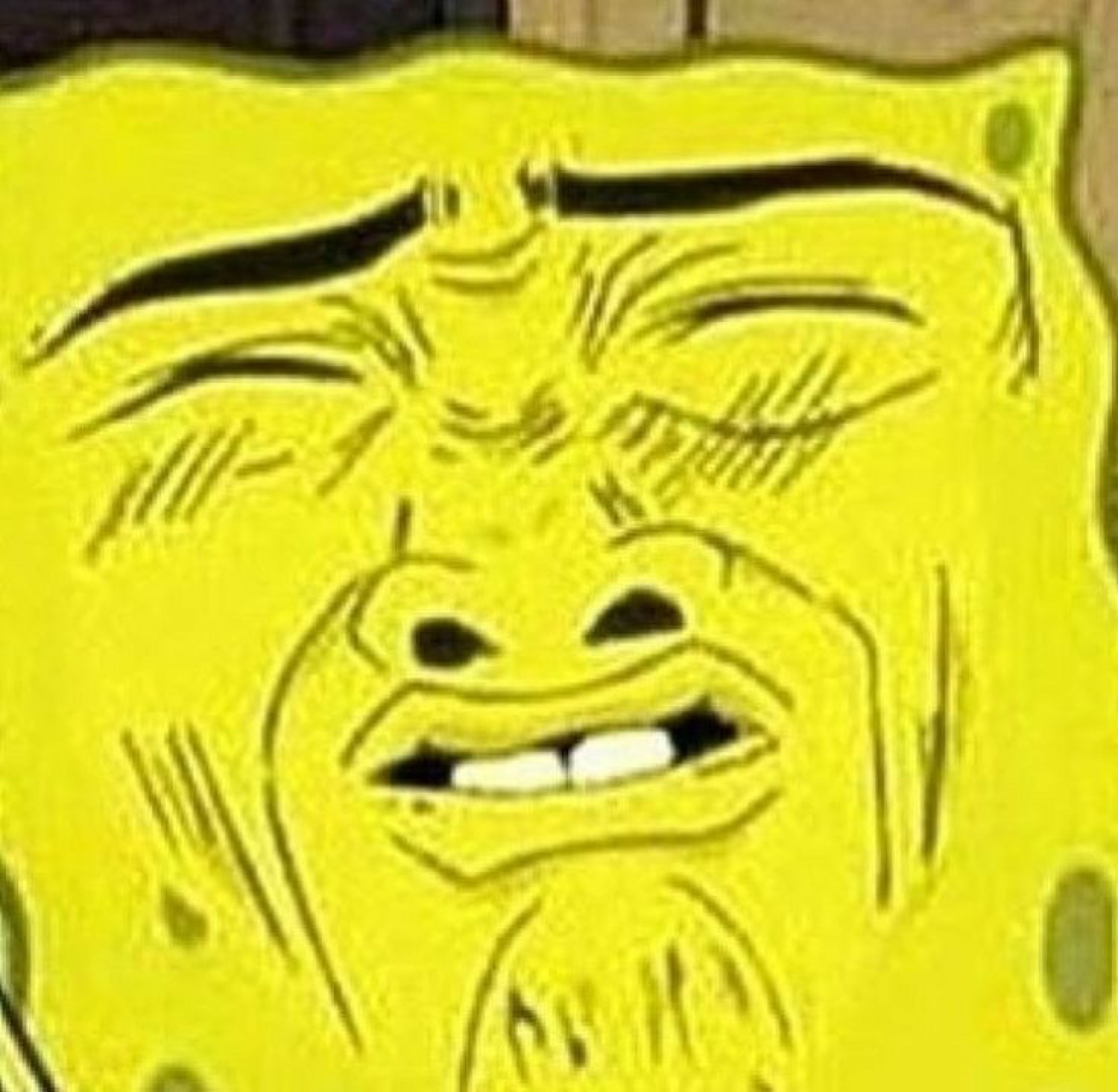 Zoomed-in SpongeBob squinting with a smug, smirking grin