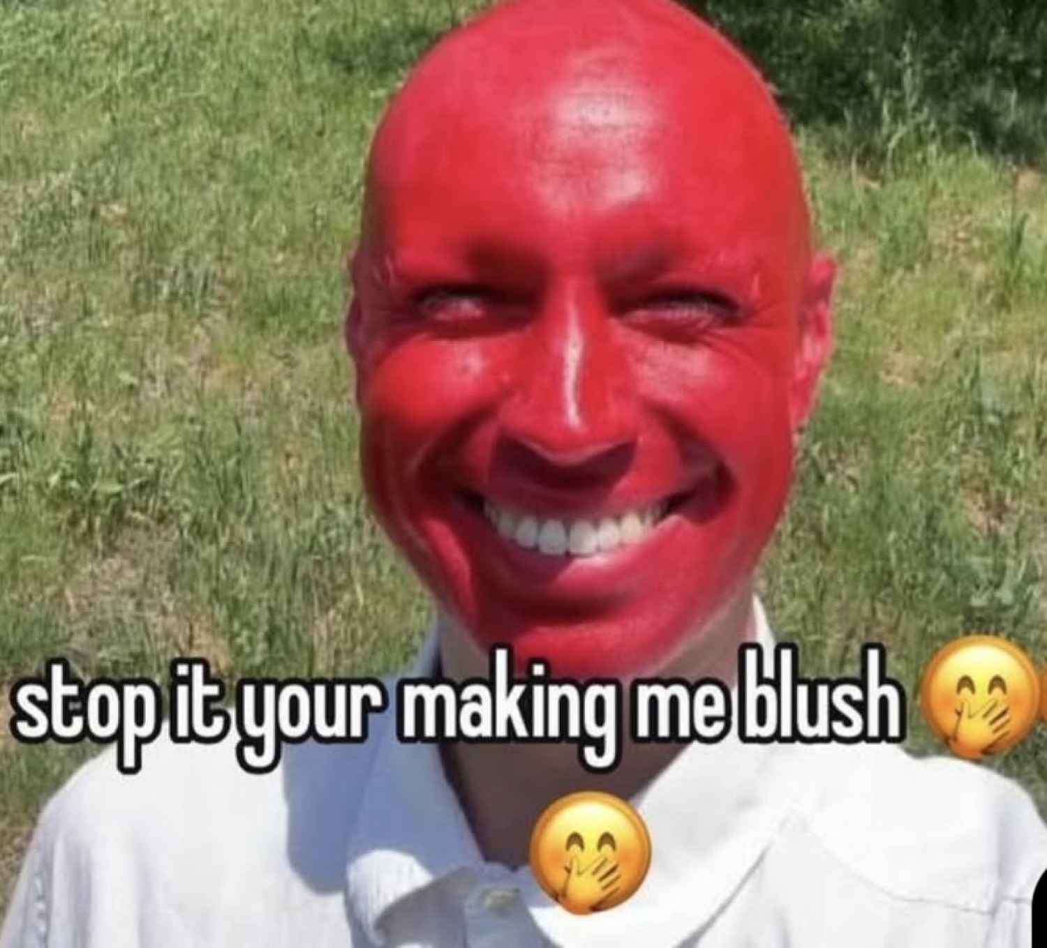 Man with face edited bright red grinning, captioned 'stop it your making me blush'