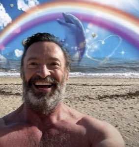 Shirtless bearded man beaming on a beach with a cartoon rainbow and dolphin behind him