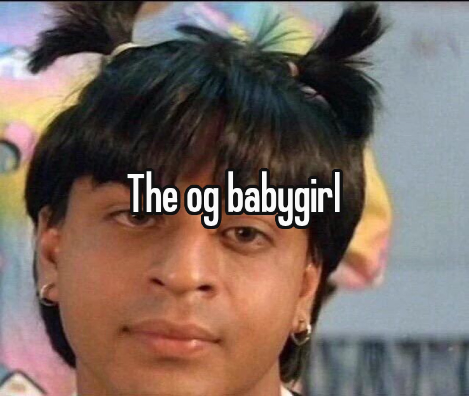 Young Shah Rukh Khan with pigtails captioned 'The og babygirl'