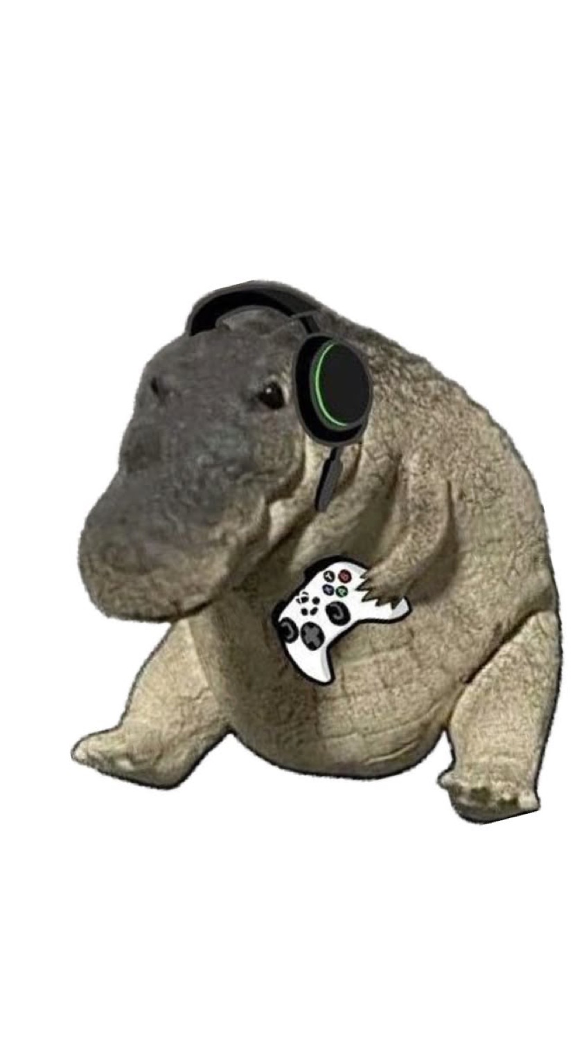 Chubby alligator figurine with gaming headphones and a controller