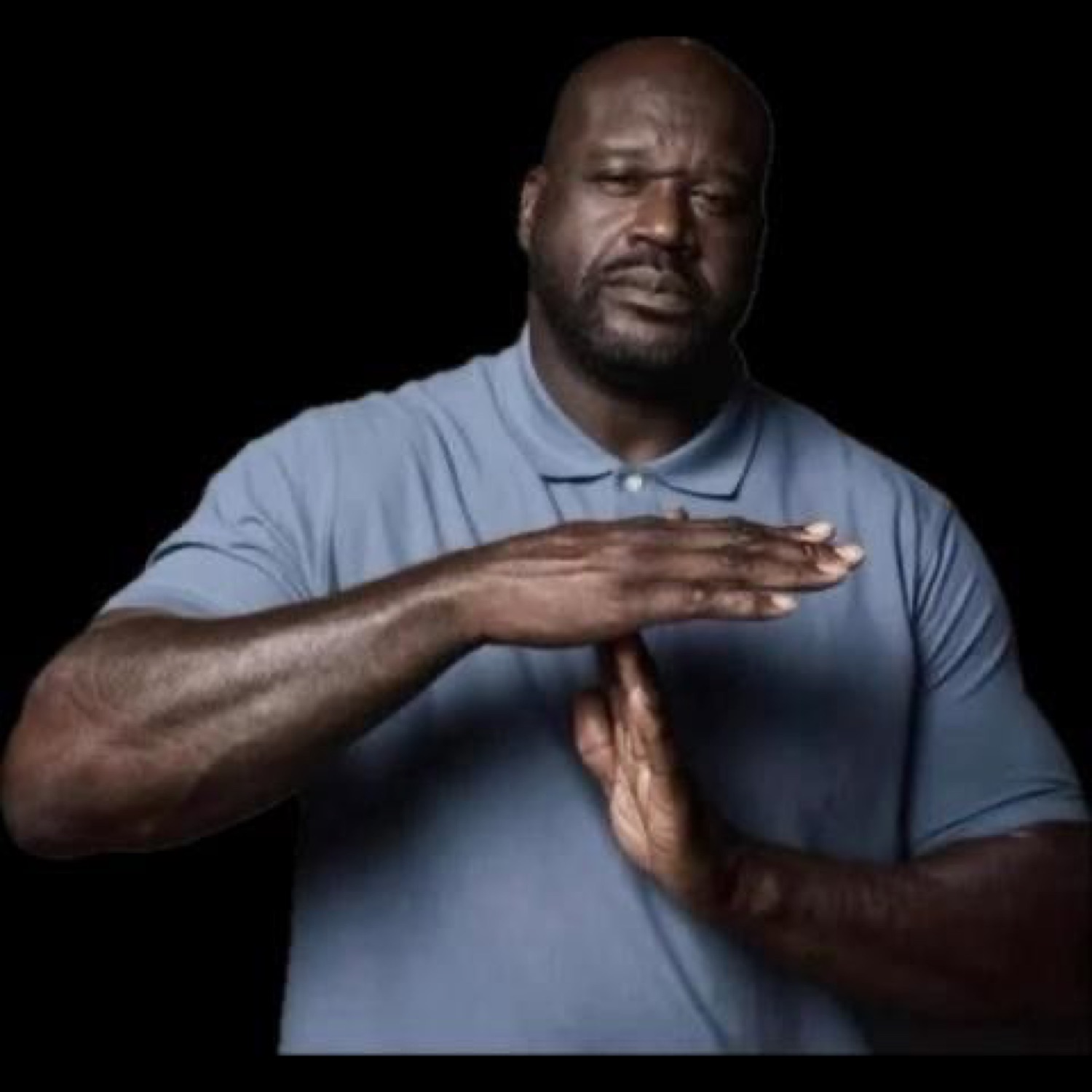 Shaquille O'Neal making a timeout 'T' with his hands