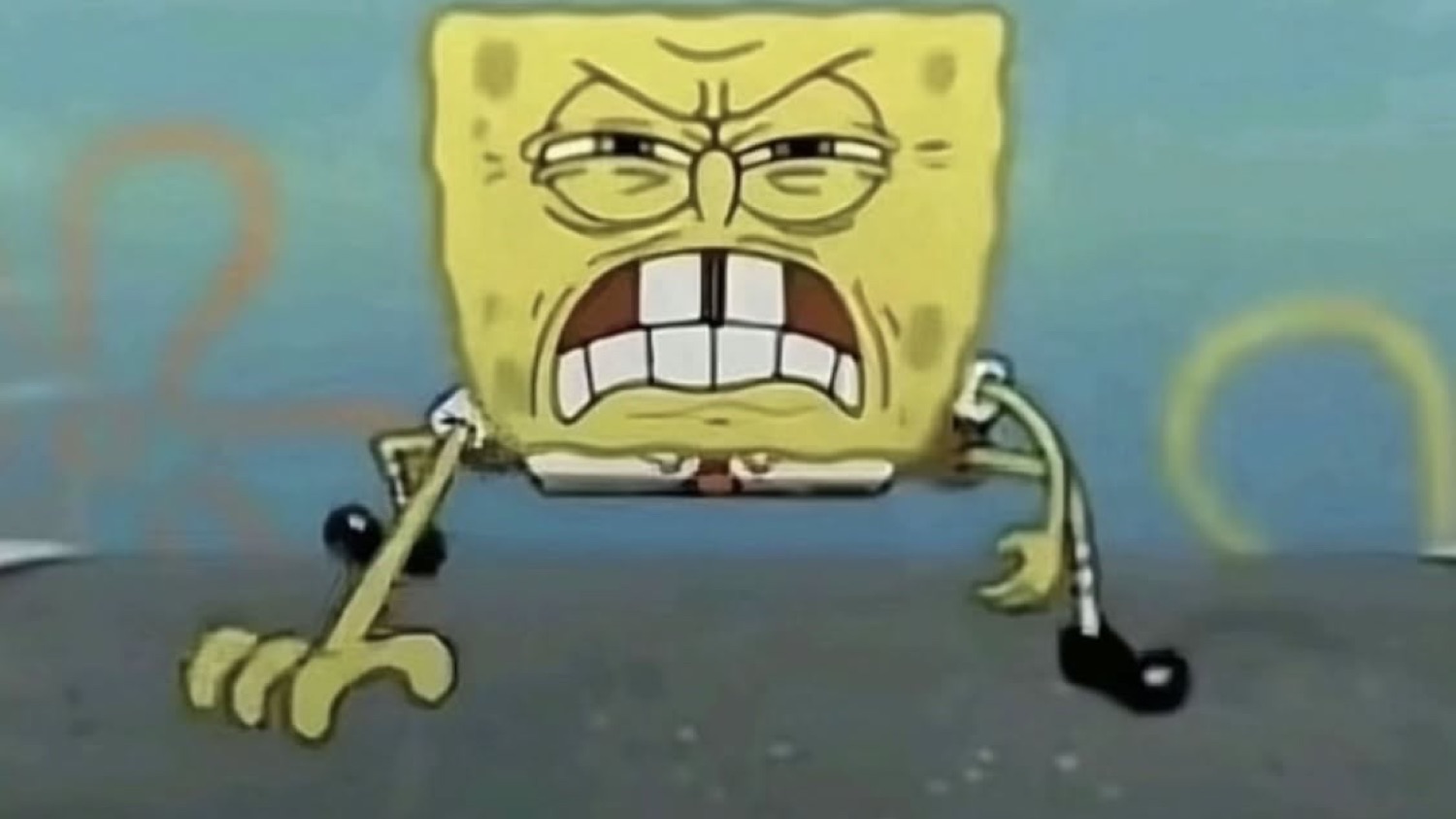 SpongeBob gritting his teeth with a furious, straining angry face
