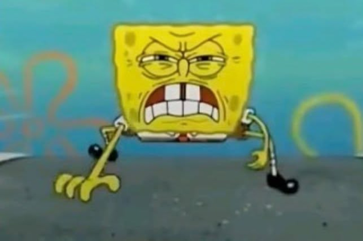 SpongeBob crouched with gritted teeth and a furious, straining scowl