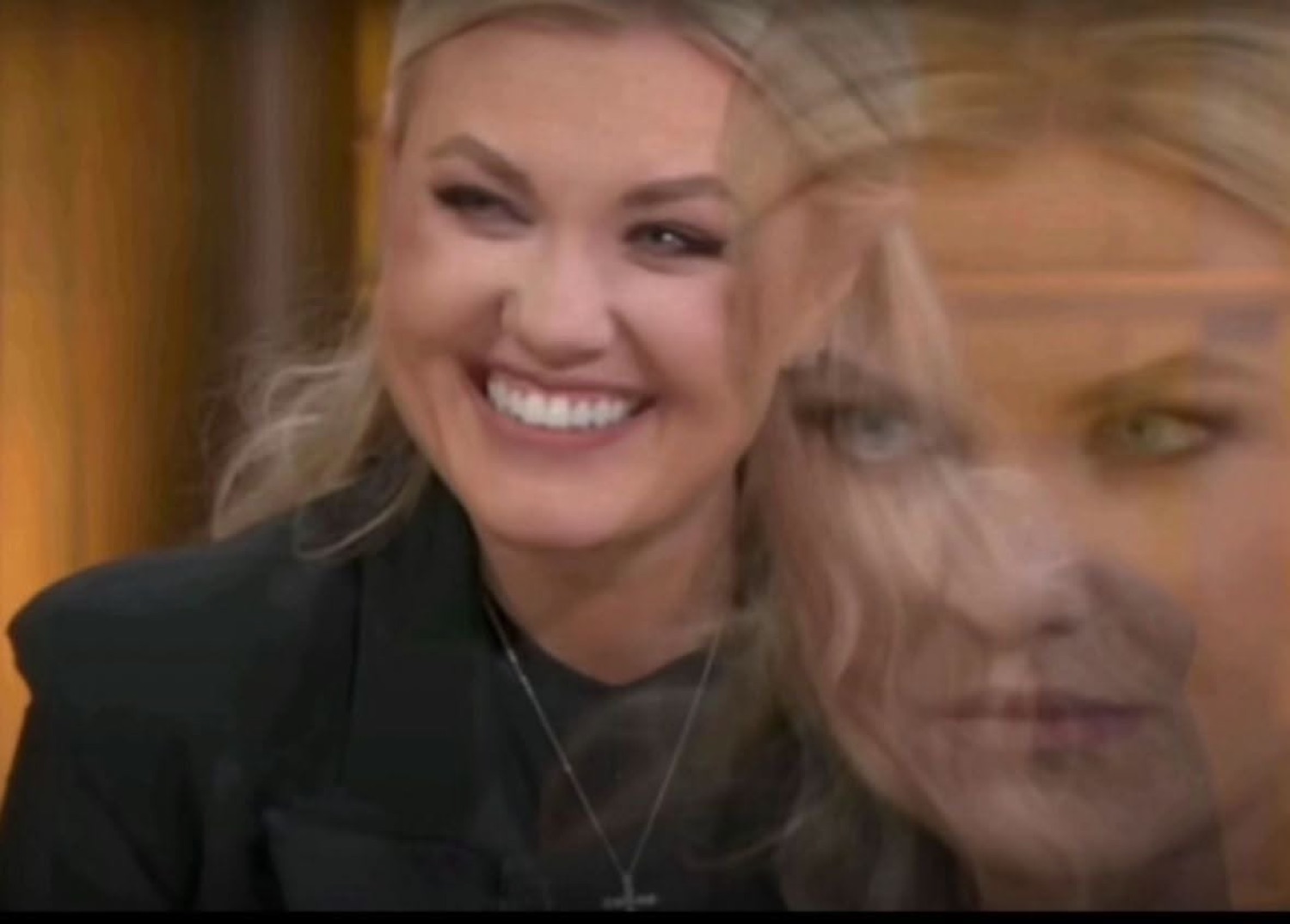 Woman beaming a bright smile with a grimacing double-exposed face fading in behind