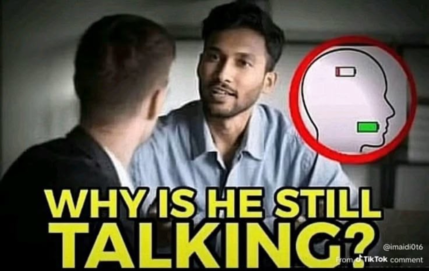 Man across a table looking drained with a near-dead battery icon over his head, captioned 'WHY IS HE STILL TALKING?'