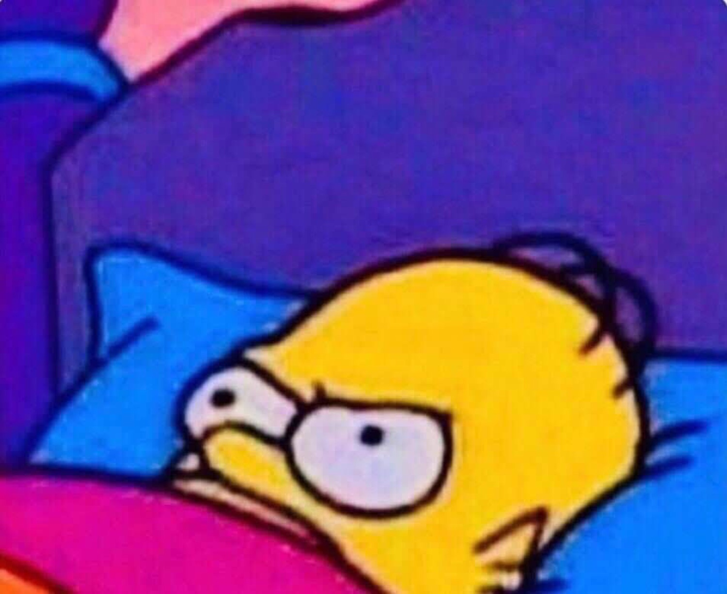 Homer Simpson lying in bed peeking out with a grumpy, suspicious side-eye