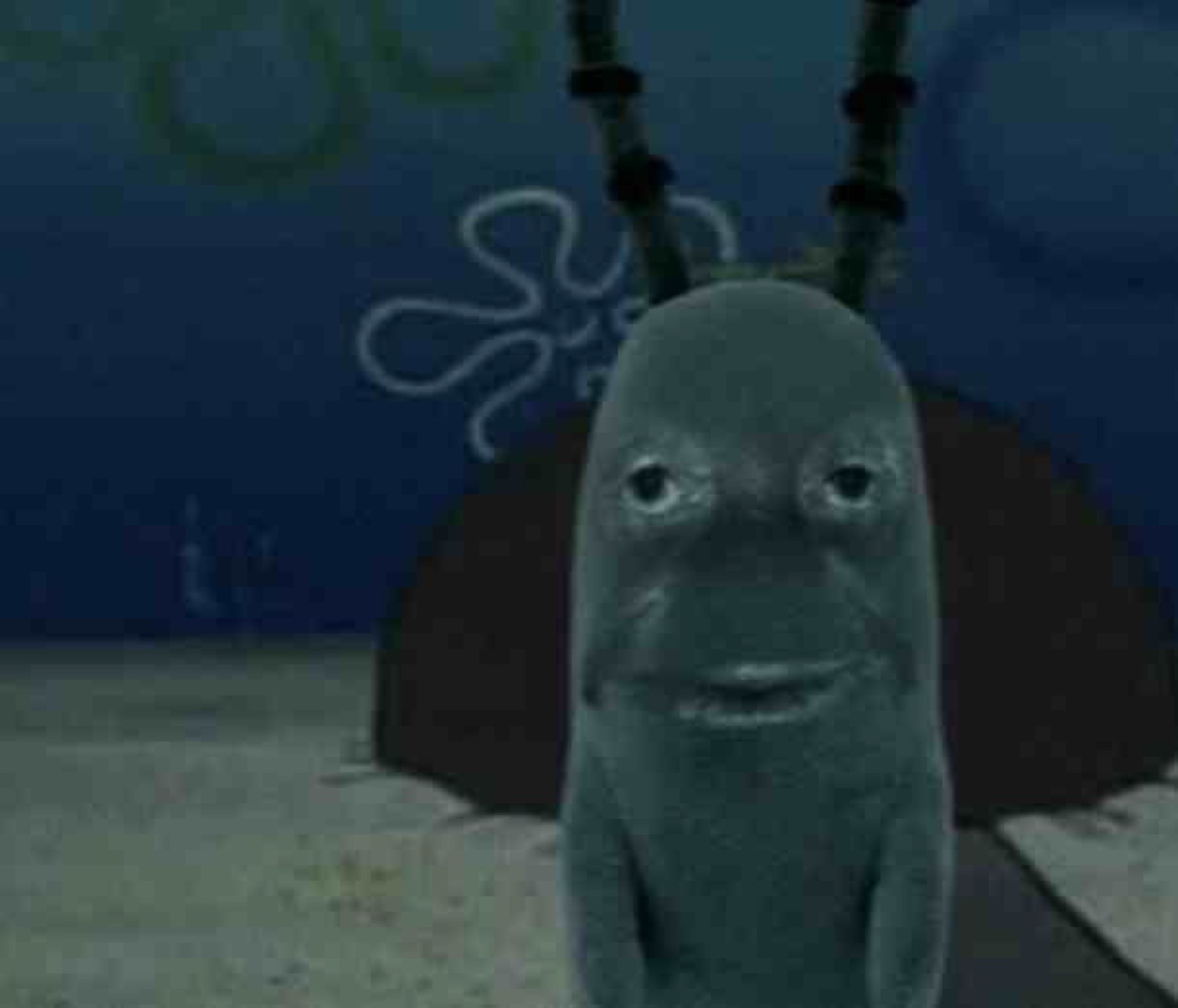 Realistic, gray, distorted Plankton standing on the seabed