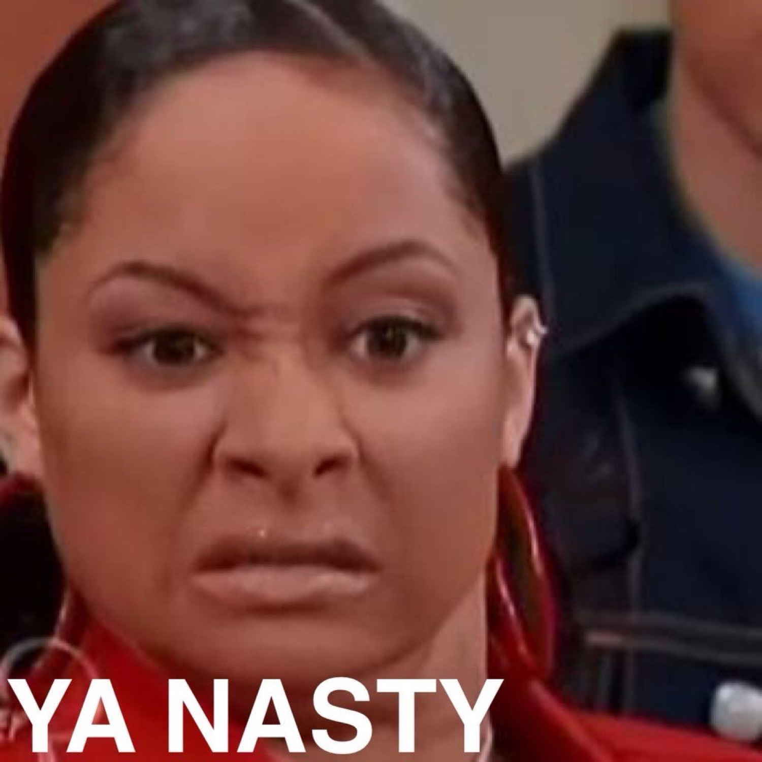 Raven-Symoné grimacing in disgust under 'YA NASTY'