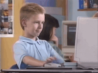 Boy at a computer turning around to give a thumbs up, the Brent Rambo meme