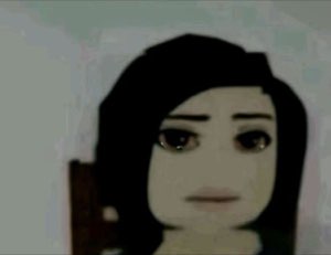 Dark-haired cartoon girl with teary eyes and a stoic sad expression