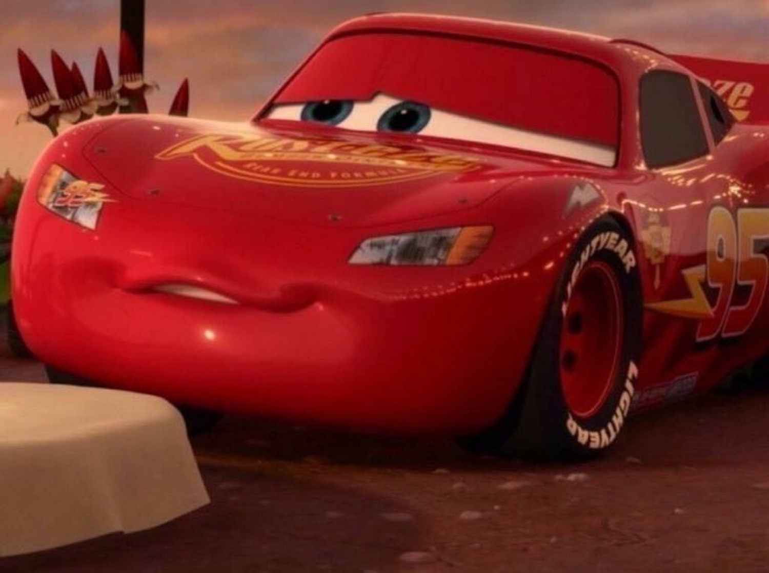Lightning McQueen giving a flat, unimpressed side look
