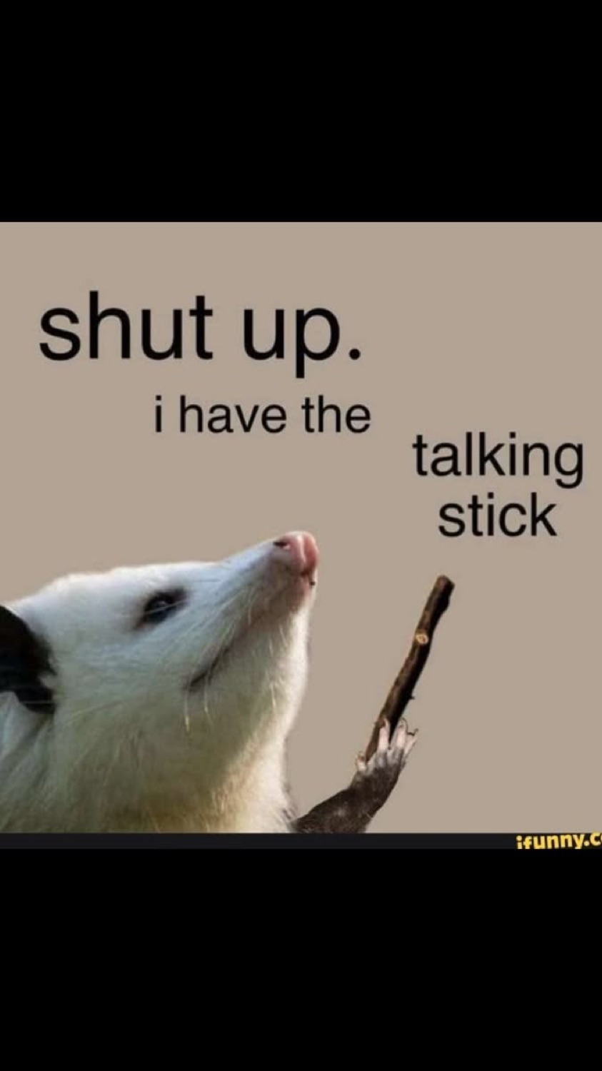 Opossum holding a stick under 'shut up. i have the talking stick'