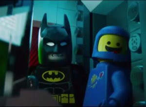 Lego Batman scowling next to a cheerfully oblivious Benny the spaceman