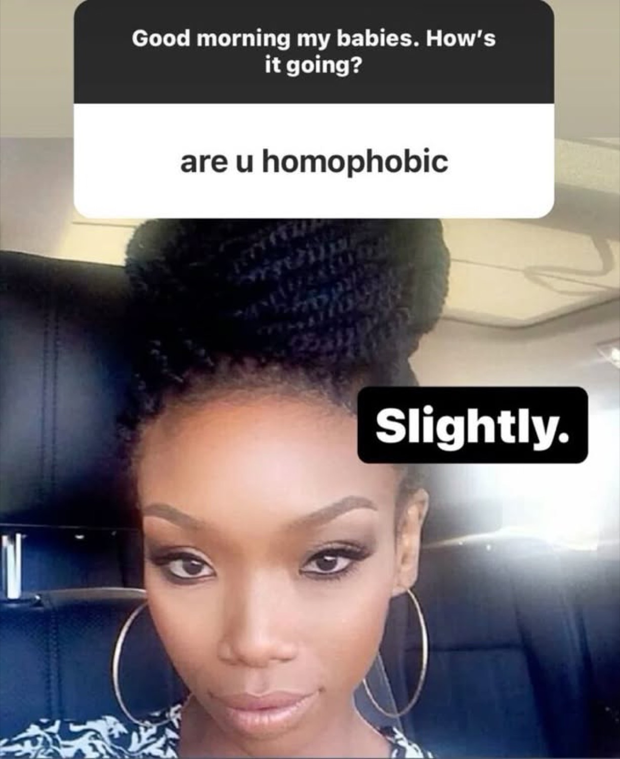 Woman answering 'Slightly.' to 'are u homophobic' with a completely straight face selfie