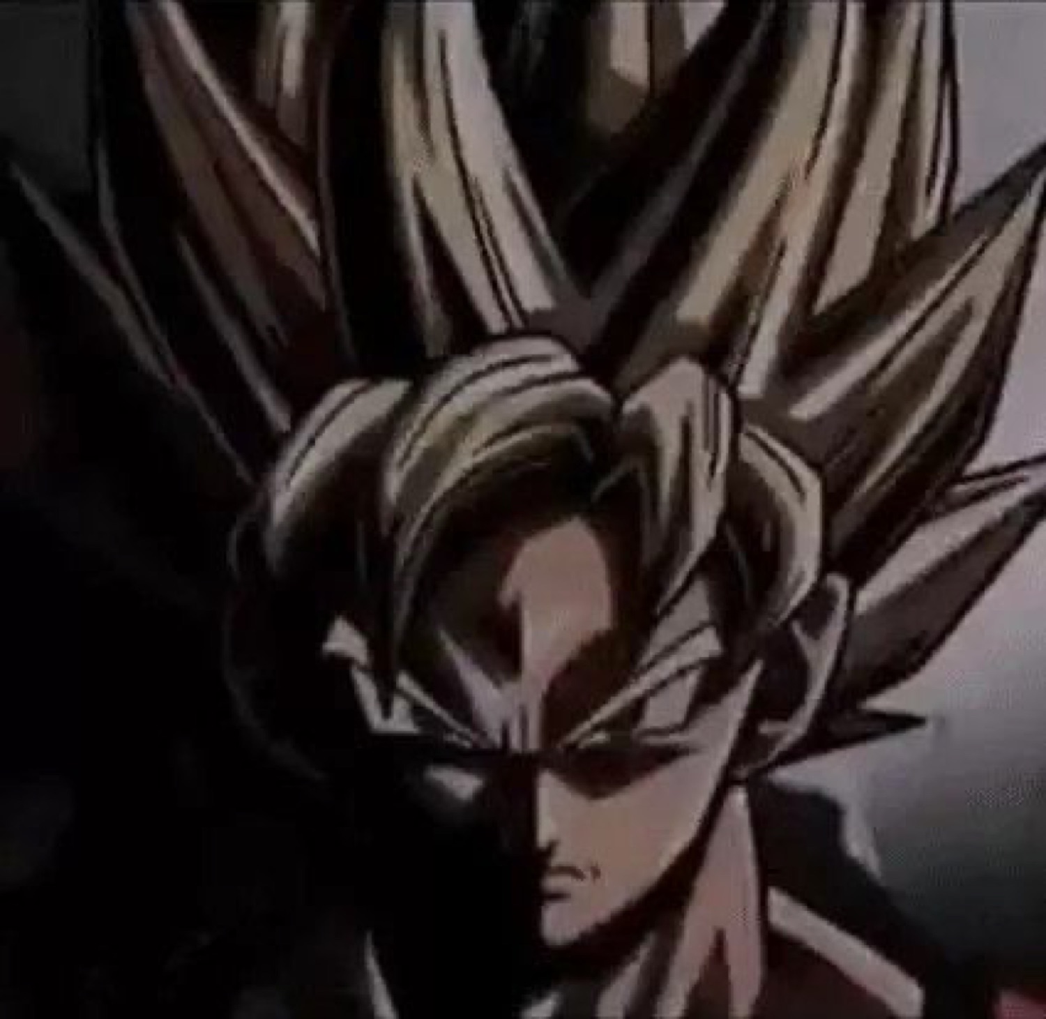 Goku (Dragon Ball) in Super Saiyan form, staring intensely from the shadows
