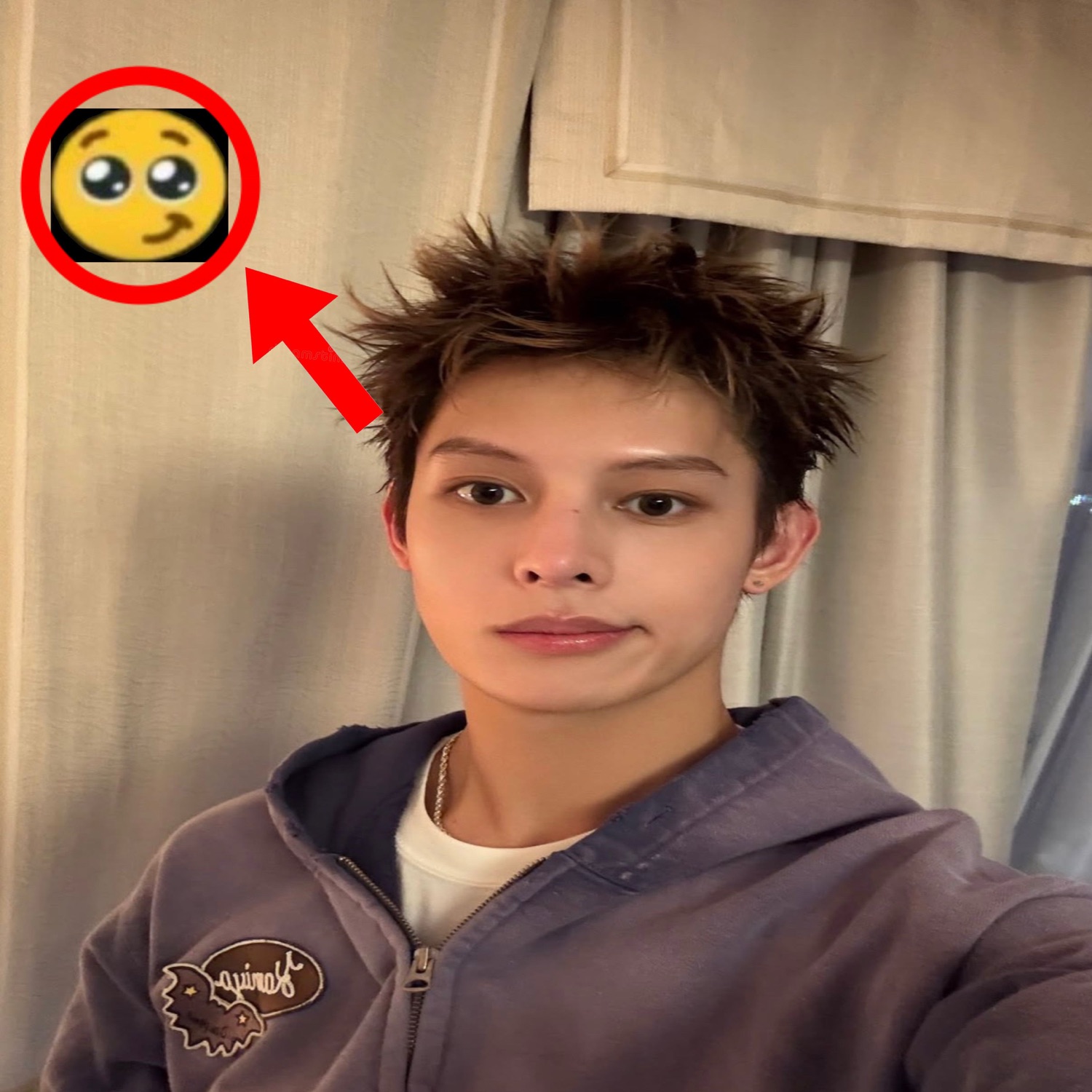 Spiky-haired teen selfie with a red arrow pointing to a shy blushing emoji overlay
