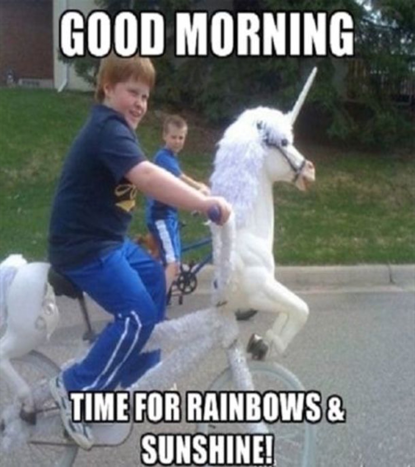Kid riding a unicorn bike: 'GOOD MORNING / TIME FOR RAINBOWS & SUNSHINE!'