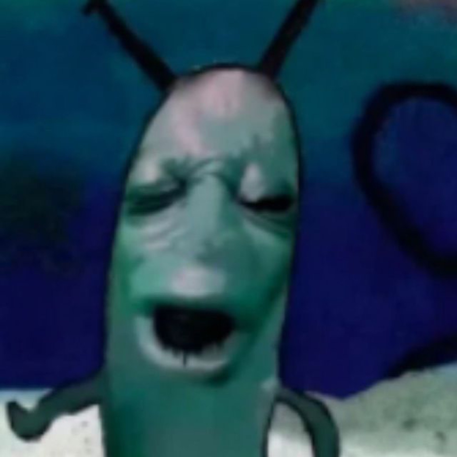 Plankton scrunching his face in disgust