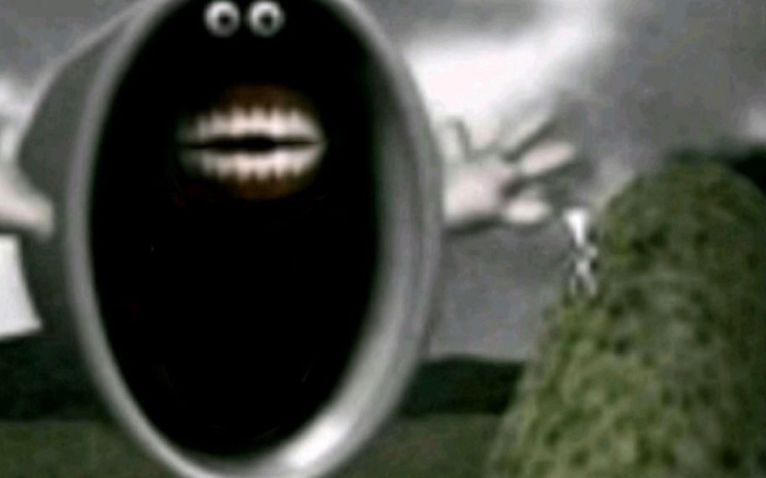 Blurry dark creature with a gaping mouth screaming at a small figure