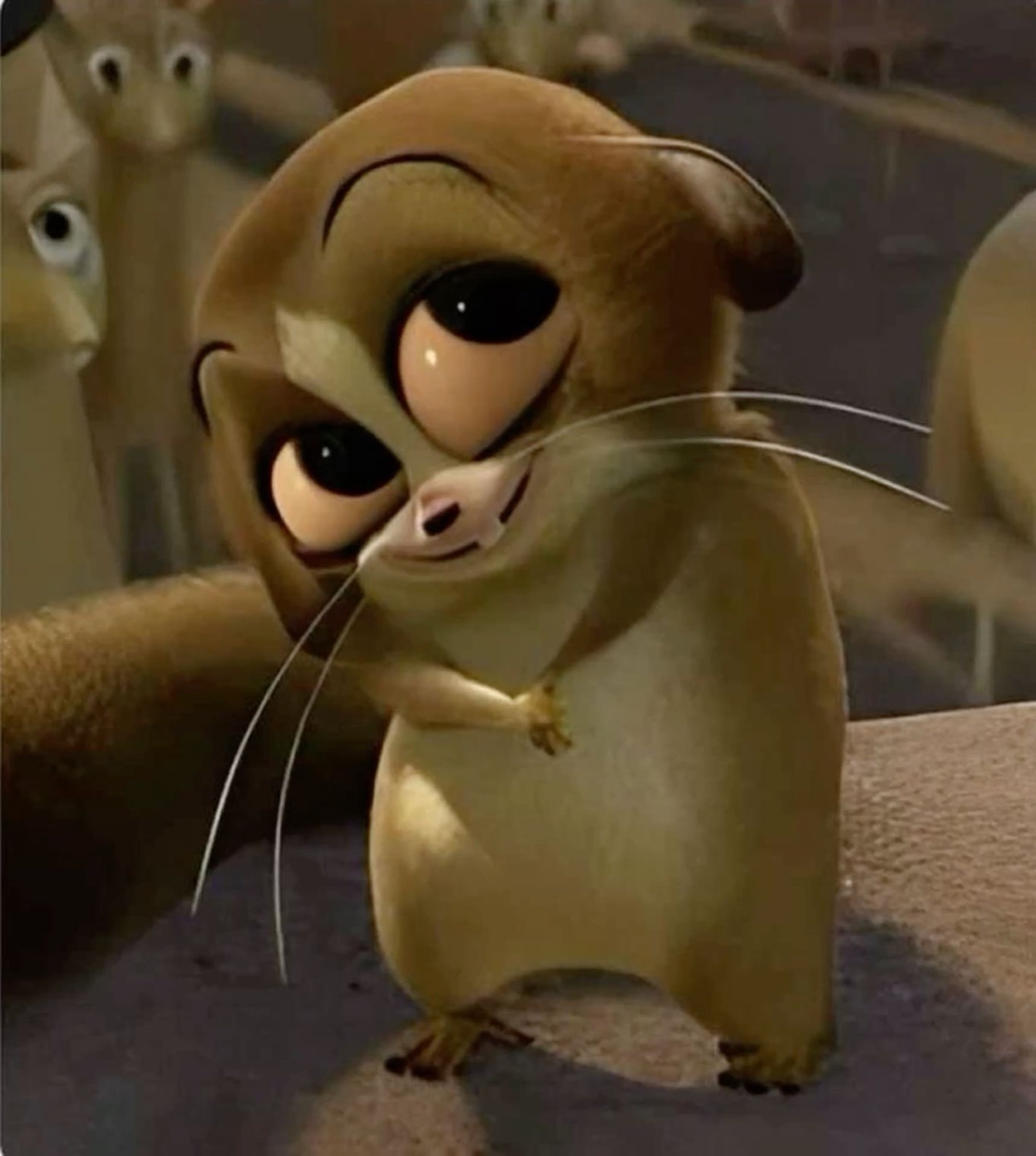 Tiny CGI animated creature with huge sad eyes hugging itself nervously