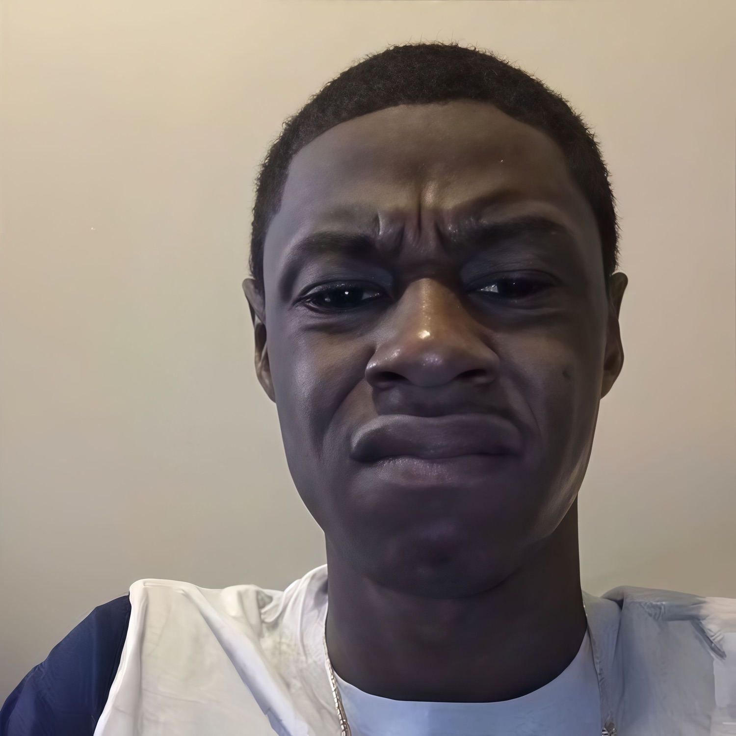Guy in a selfie with a screwed-up, disgusted grimace