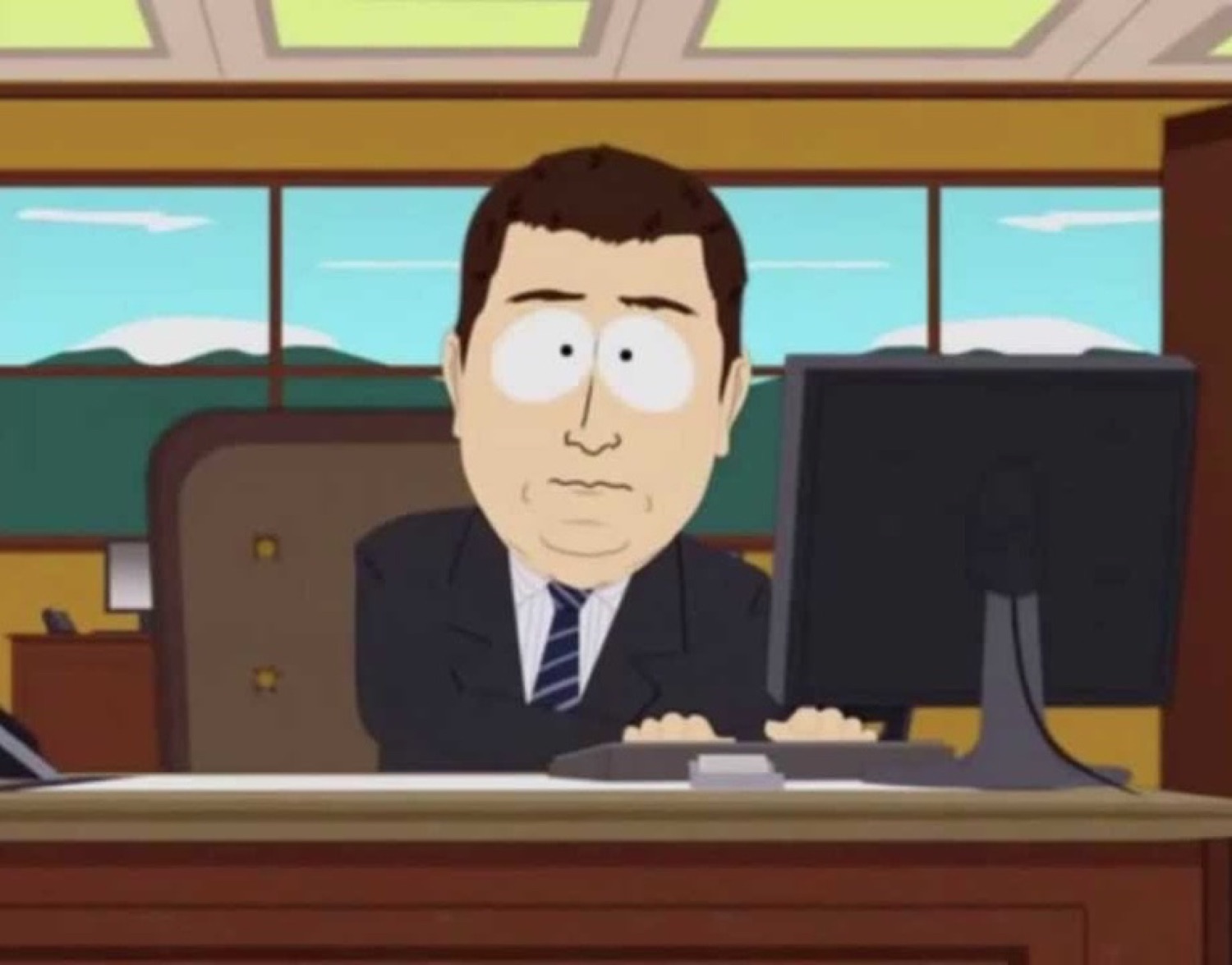 South Park-style office man at a computer giving a wide-eyed blank stare