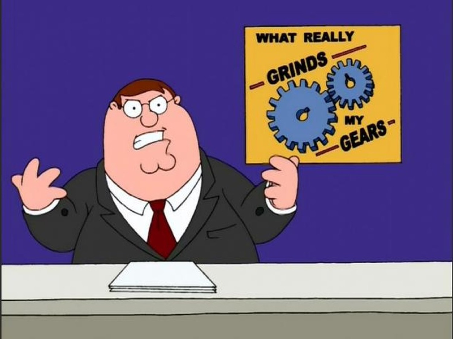 Peter Griffin at a news desk ranting under a sign reading 'What really grinds my gears'