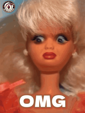 Barbie doll with wide shocked eyes, "OMG"