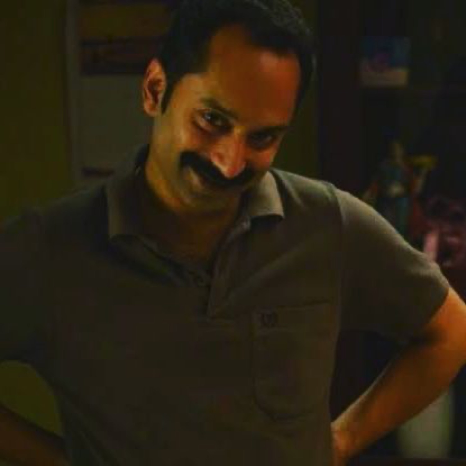 Fahadh Faasil with a knowing smirk