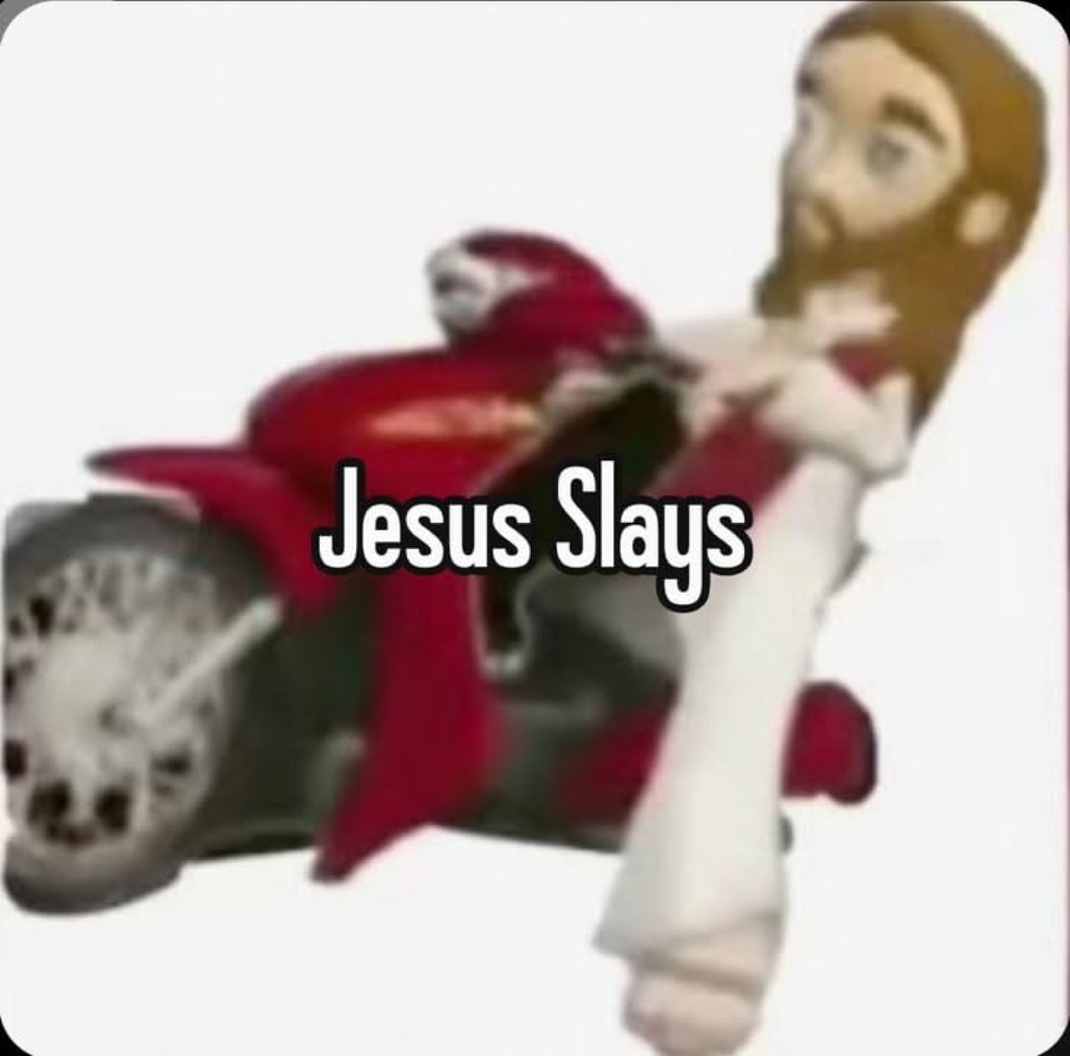 Plush Jesus riding a red motorcycle: 'Jesus Slays'
