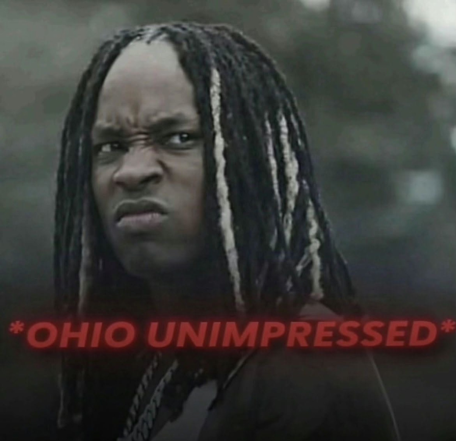 Man scowling with a deeply unimpressed glare captioned '*Ohio unimpressed*'